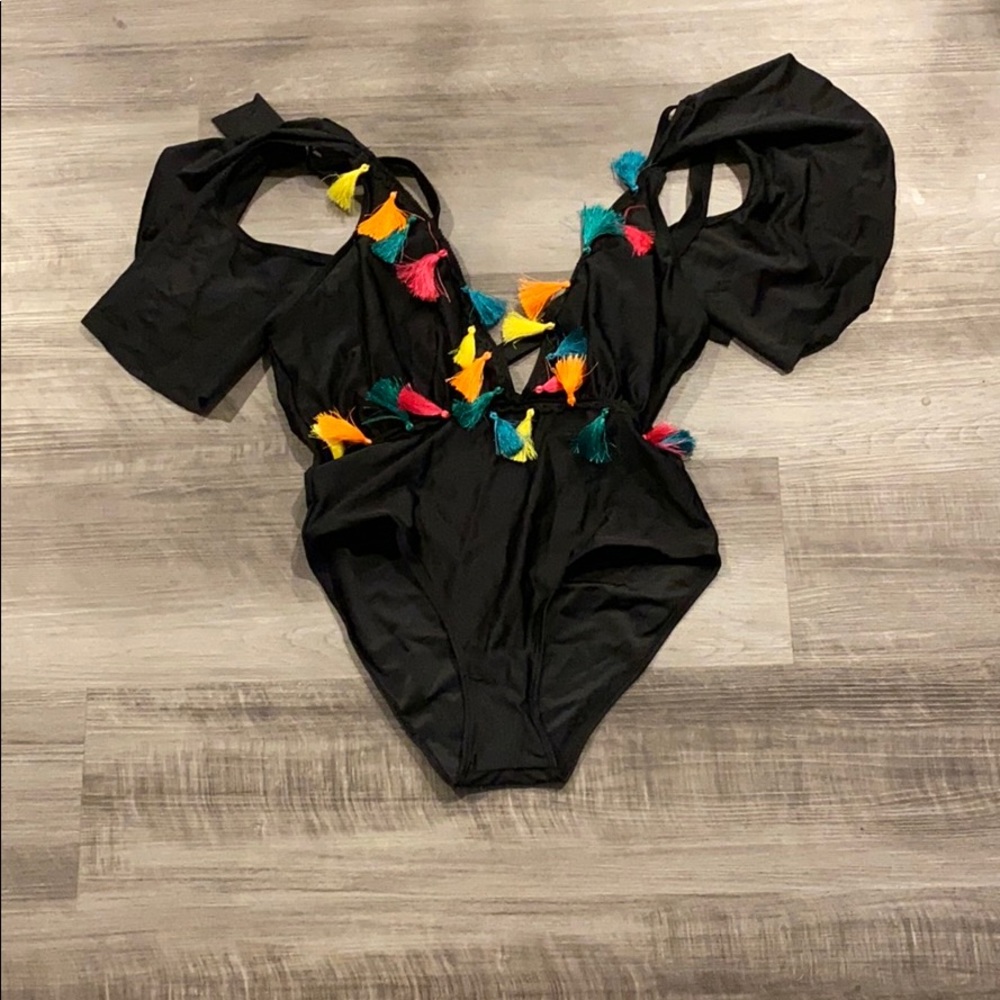 Black one piece with multicolored tassels